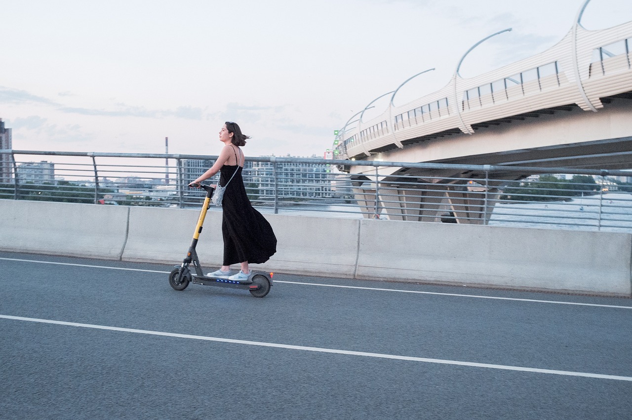 our-story woman, electric scooter, street, scooter, transportation, city, e-scooter, electric scooter, electric scooter, scooter, scooter, scooter, scooter, scooter